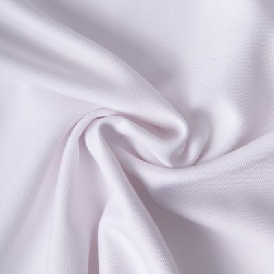 Tissu Sergé Polyviscose  Hispania sur fond Blanc - Par 10 cm