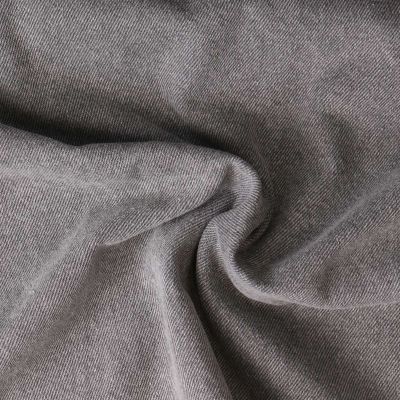 Tissu Jean denim épais  Nims sur fond Gris - Par 10 cm
