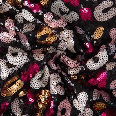 Tissu Sequins épais léopard multicolore sur fond Noir - Par 10 cm