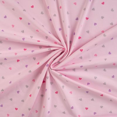 Tissu Jersey Coton Coeurs roses, lilas et argent pailleté sur fond Rose pâle - Par 10 cm