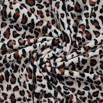 Tissu Doudou motif léopard sur fond Beige sable - Par 10 cm