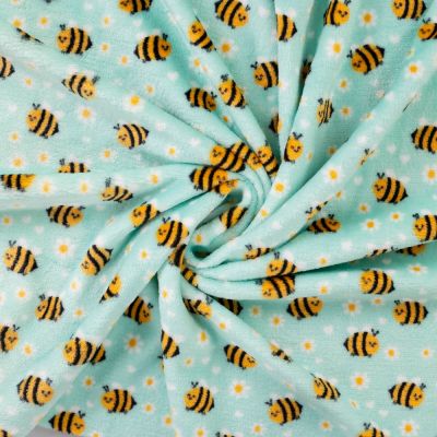 Tissu Doudou imprimé Abeilles fleuries sur fond Vert menthe clair - Par 10 cm
