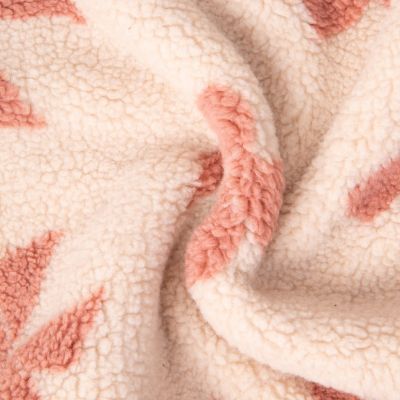 Tissu Fausse fourrure Teddy Sherpa noeuds ballerine sur fond Beige - Par 10 cm