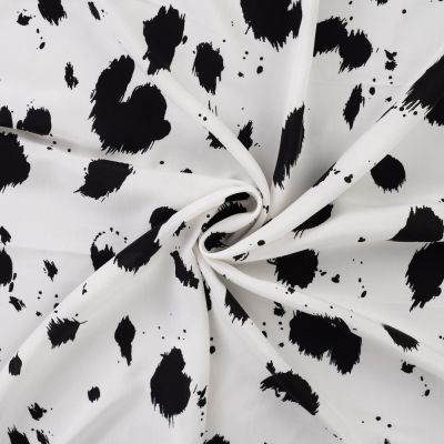 Tissu Viscose imprimé Taches noires éclatées sur fond Blanc - Par 10 cm