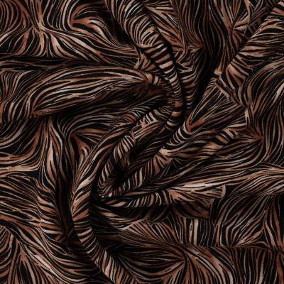 Tissu Viscose twill feuillage graphique Cognac et Noisette sur fond Noir - Par 10 cm