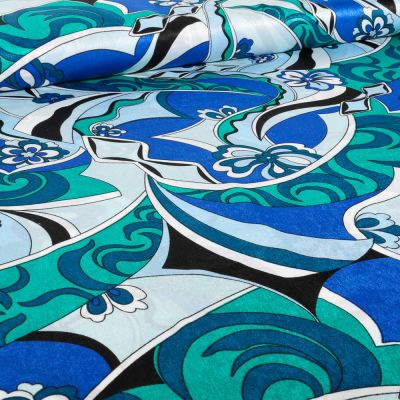 Tissu Satin imprimé Ritva sur fond Bleu - Par 10 cm