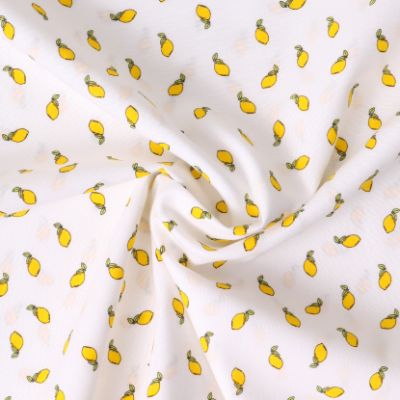 Tissu Popeline de Coton Petits citrons jaunes sur fond Blanc - Par 10 cm