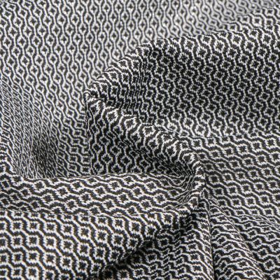 Tissu Jacquard extensible Alvé sur fond Noir - Par 10 cm