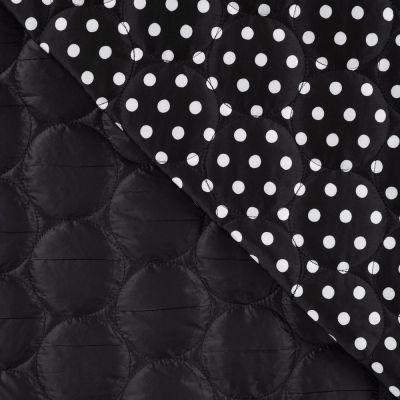 Tissu Doudoune matelassé Betty réversible petits pois Blanc sur fond Noir - Par 10 cm