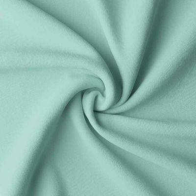 Tissu Coton enduit uni Vert menthe - Par 10 cm