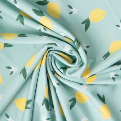 Tissu Lycra maillot de bain anti UV citron Amalina sur fond Vert menthe - Par 10 cm