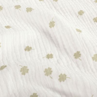 Tissu Double gaze de Coton Trèfles vert amande sur fond Blanc - Par 10 cm