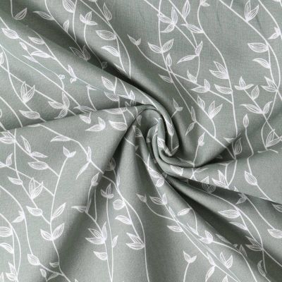 Tissu Popeline de Coton  feuilles Alexia sur fond Vert kaki clair - Par 10 cm