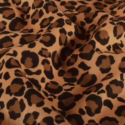 Tissu Velours milleraies Jaya imprimé léopard sur fond Camel - Par 10 cm