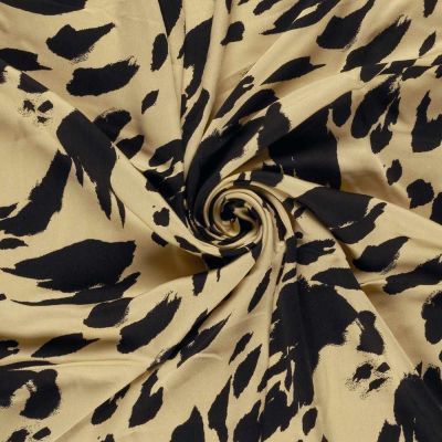 Tissu satin de viscose  imprimé tacheté noir sur fond Jaune - Par 10 cm