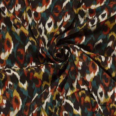 Tissu satin de viscose imprimé  effet ikat multicolore sur fond Vert - Par 10 cm