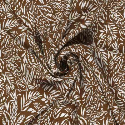Tissu crêpe de viscose imprimé Fleuris blanc sur fond Marron clair - Par 10 cm