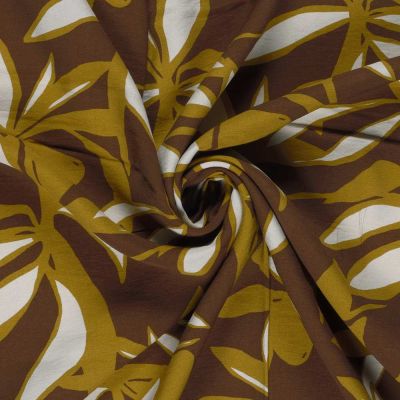 Tissu crêpe de viscose imprimé Fleuris blanc et or sur fond Marron - Par 10 cm