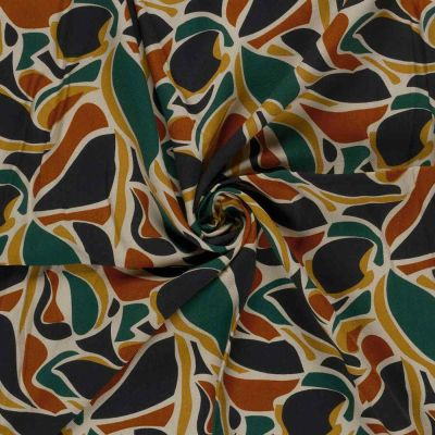 Tissu Viscose sergé imprimé motifs feuilles sur fond Vert - Par 10 cm