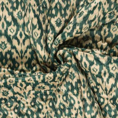 Tissu velours matelassé imprimé envers uni motif ethnique sur fond Vert - Par 10 cm