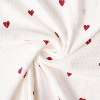 Coupon Tissu Jersey 100% Coton ajouré Baby petits coeurs sur fond Ecru - Coupon de 20 cm