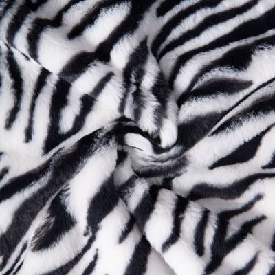 Tissu Fausse fourrure Léna Zébré Noir sur fond Blanc - Par 10 cm