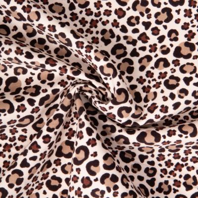Tissu Velours milleraies imprimé Bendja léopard sur fond Ecru - Par 10 cm