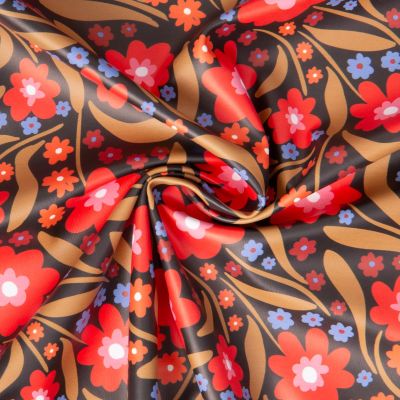 Tissu Imperméable imprimé Beyonce fleuris rouge sur fond Noir - Par 10 cm