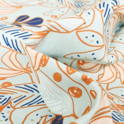 Tissu Viscose Guzalor sur fond Vert menthe - Par 10 cm