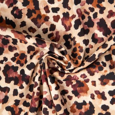 Tissu Viscose imprimé Leolynx chocolat sur fond Beige - Par 10 cm