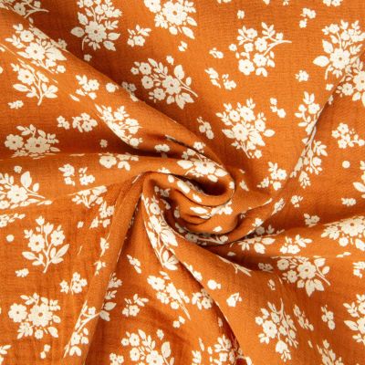 Tissu Double gaze de Coton Osma fleuris sur fond Orange - Par 10 cm