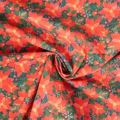 Tissu Coton imprimé Stella fleurs de Noël sur fond Vert sapin - Par 10 cm