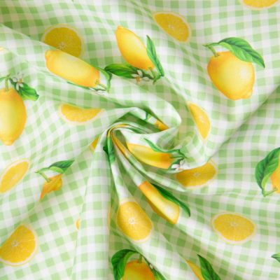 Tissu Coton imprimé Carreaux verts et citrons jaunes sur fond Blanc - Par 10 cm