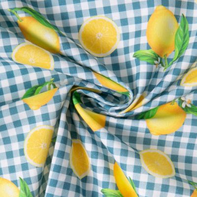 Tissu Coton imprimé Carreaux bleu et citrons, oranges jaunes sur fond Blanc - Par 10 cm