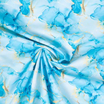 Tissu Coton imprimé Agate marbré Bleu et Or sur fond Bleu clair - Par 10 cm