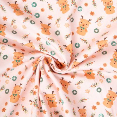 Tissu Coton imprimé Rudolph rennes festifs sur fond Rose pâle - Par 10 cm