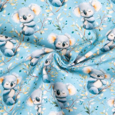 Tissu Coton imprimé Koko charme fleuris sur fond Bleu ciel - Par 10 cm
