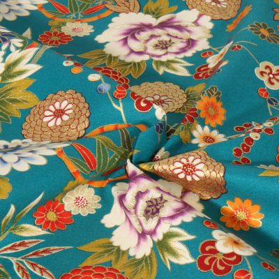 Tissu coton imprimé motifs floraux Japonais sur fond Bleu turquoise - Par 10 cm