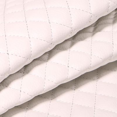 Tissu Simili cuir matelassé uni Chelsy Blanc - Par 10 cm