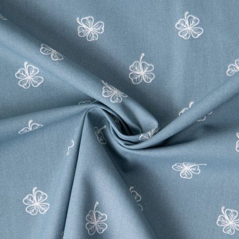 Tissu Popeline de Coton Clovers blancs sur fond Bleu