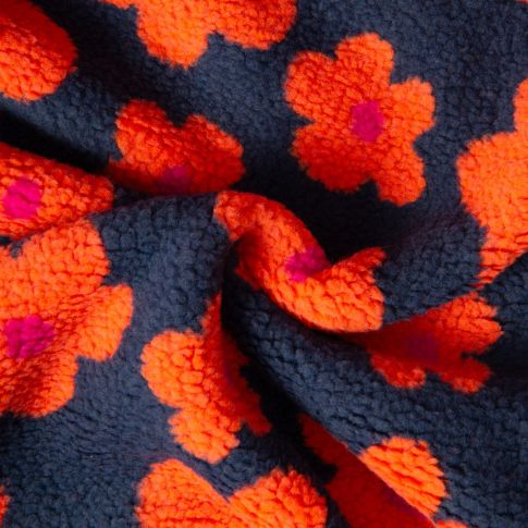 Tissu Sherpa Elya Fleurs oranges sur fond Bleu foncé