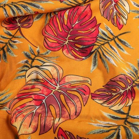 Coupon Tissu Viscose  Feuilles de Monstera corail sur fond Jaune - Coupon de 70 cm