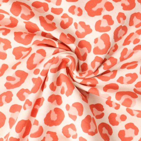 Tissu Sweat léger envers molletonné Naïa léopard Orange sur fond Beige