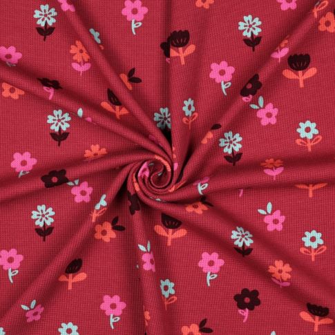 Tissu Jersey Nid d'abeille imprimé Fleurs sur fond Framboise