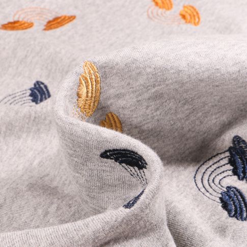 Coupon Tissu Sweat Léger envers gratté  Arc en ciel brodés ocre sur fond Gris chiné - Coupon de 430 cm