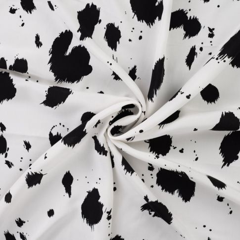Tissu Viscose imprimé Taches noires éclatées sur fond Blanc