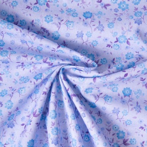 Tissu Popeline de Coton légère Petites fleurs bleues sur fond Lilas