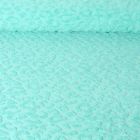 Tissu Maille motif léopard éponge sur fond Vert menthe - Par 10 cm