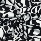 Tissu Coton satiné Iris motif abstrait Noir sur fond Blanc