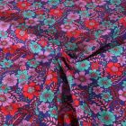 Tissu Popeline de Coton Poppy Fleurs bleues et lilas sur fond Bleu roi